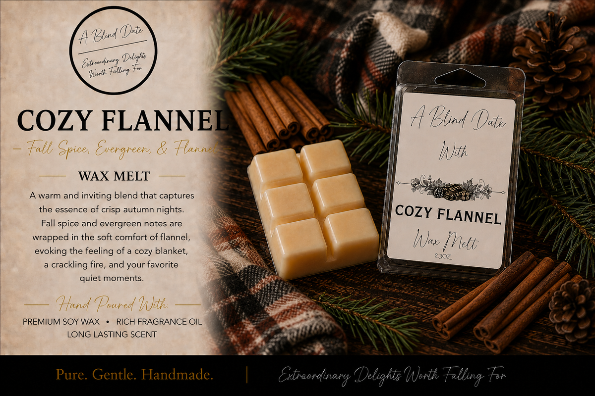 “Cozy Flannel soy wax melt by A Blind Date, scented with fall spice, evergreen, and flannel, displayed with cinnamon sticks, pine branches, pinecones, and cozy plaid fabric.”
