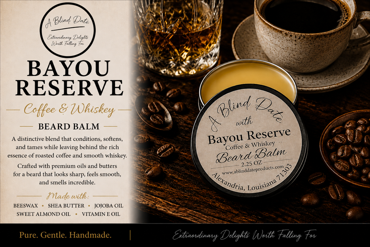 Bayou Reserve Coffee & Whiskey Beard Balm shown in an open round tin beside a branded label panel, with coffee cups, coffee beans, and a whiskey glass in a dark rustic setting.