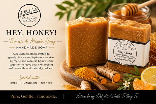 Handmade Turmeric & Manuka Honey soap bars shown in a styled product photo with honey jars, turmeric roots, lemon slices, and text on the left. The soap has visible labels reading 'Hey, Honey! Turmeric & Manuka Honey Handmade Soap' and 'A Blood Date With Falling Fall.