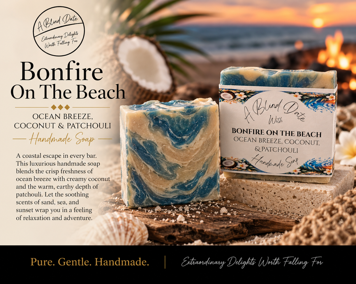 A Blind Date Bonfire on the Beach handmade soap with blue and cream swirls, displayed with coconut, seashells, driftwood, and a glowing beach bonfire at sunset.